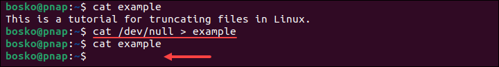 Truncating a file using shell redirection and the cat symbol.